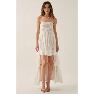 Modenaire Strapless High-low Dress With Sheer Bodice And Tiered Skirt In Brown