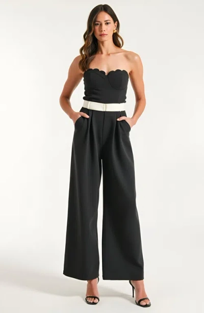 Modenaire Strapless Jumpsuit With Scalloped Bodice, Waist Belt And Wide-leg Pants In Black