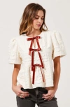 Modenaire Textured Puff-sleeve Peplum Blouse With Bow-tie Front