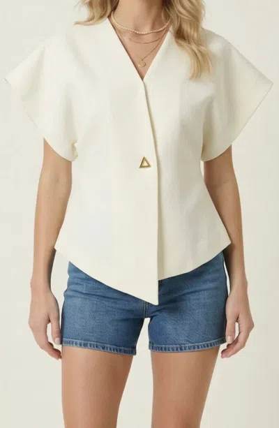 Modenaire Textured Wrap Top In Neutral