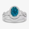Modern Bride Gemstone Womens 1/2 Ct. T.w. Genuine Blue Topaz 10k White Gold Oval Side Stone Crossover Engagement  In Silver