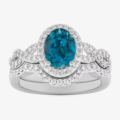 Modern Bride Gemstone Womens 1/2 Ct. T.w. Genuine Blue Topaz 10k White Gold Oval Side Stone Crossover Engagement  In Silver