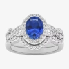 Modern Bride Gemstone Womens 1/2 Ct. T.w. Genuine Blue Topaz 10k White Gold Oval Side Stone Crossover Engagement  In Silver