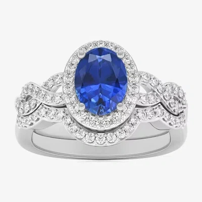 Modern Bride Gemstone Womens 1/2 Ct. T.w. Genuine Blue Topaz 10k White Gold Oval Side Stone Crossover Engagement  In Silver