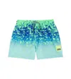 Molo Boy's Niko Splatter Swim Trunks In Splash