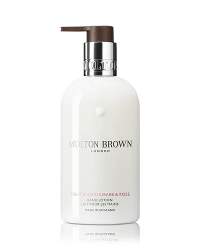 Molton Brown Delicious Rhubarb & Rose Hand Lotion 10 Oz. In Transparent
