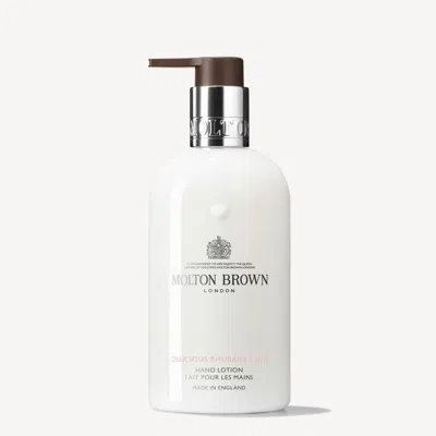 Molton Brown Delicious Rhubarb & Rose Hand Lotion 10fl. Oz. In Transparent