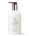 Molton Brown London 10oz Flora Luminare Hand Lotion
