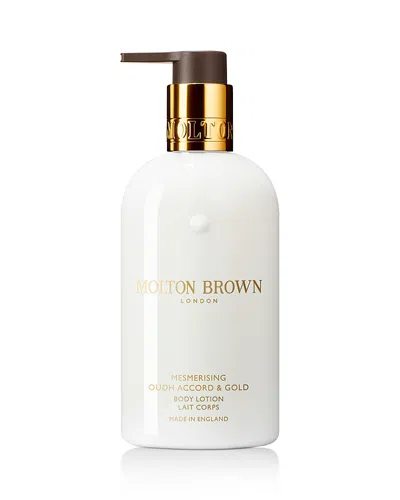 Molton Brown Mesmerising Oudh Accord & Gold Body Lotion 10 Oz. In Transparent