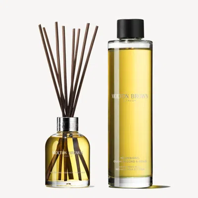 Molton Brown Mesmerising Oudh & Gold Accord Aroma Reeds & Refill Gift Set