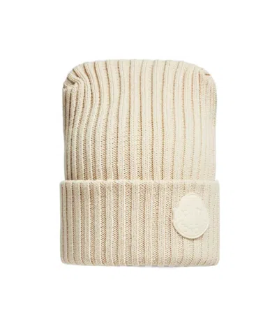 Moncler A Woolen Hat Affixed To The Logo In Nude