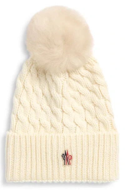 MONCLER MONCLER APRÈS SKI CABLE KNIT VIRGIN WOOL BEANIE WITH FAUX FUR POMPOM