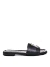 Moncler Black Slides With Distinctive Gold Emblem In Black