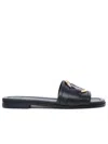 Moncler Black Slides With Distinctive Gold Emblem In Black