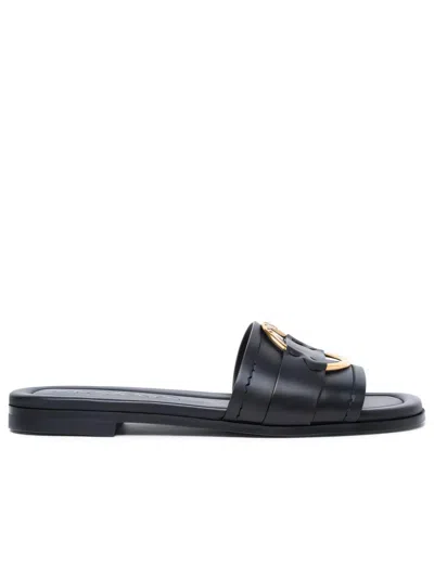 Moncler Black Slides With Distinctive Gold Emblem