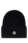 Moncler Ribbed Knit Carded Wool Beanie With Felt Logo Patch In Black