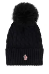 Moncler Wool Hat Featuring Cable Knit And Pom Detail In Black