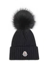 Moncler Ribbed Knit Wool Beanie With Faux Fur Pom-pom In Black