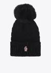 Moncler Cable Knit Logo Pom Pom Beanie In Black