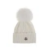 Moncler Bonnet En Cachemire Et Laine Avec Pompon In Neutral