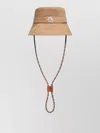 Moncler Logo Patch Drawstring Bucket Hat In Neutral