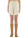 Moncler Grenoble Shorts With Logo Patch In Neutral