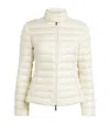 Moncler Fitted Quilted Feather Down Jacket With High Collar In Beige