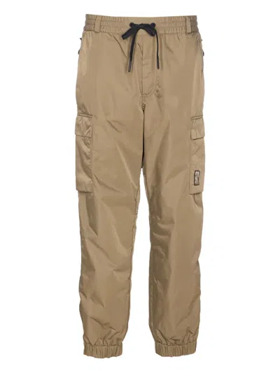 Moncler Elasticated Logo-patch Trousers In Brown