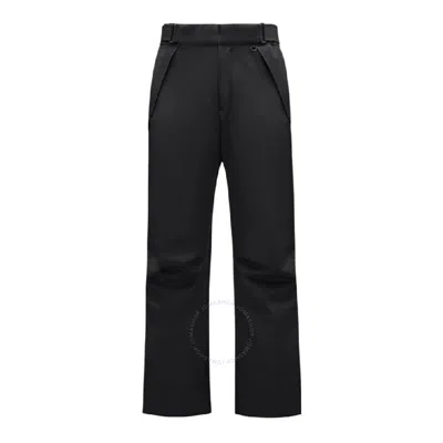 Moncler Embossed Logo Ski Pants In Black
