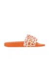 Moncler Round Toe Flat Sole Jeanne Rubber Slippers In Orange