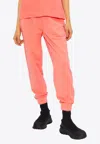 Moncler Embossed Logo Track Pants In Pink