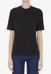 Moncler Embossed Logo T-shirt In Black