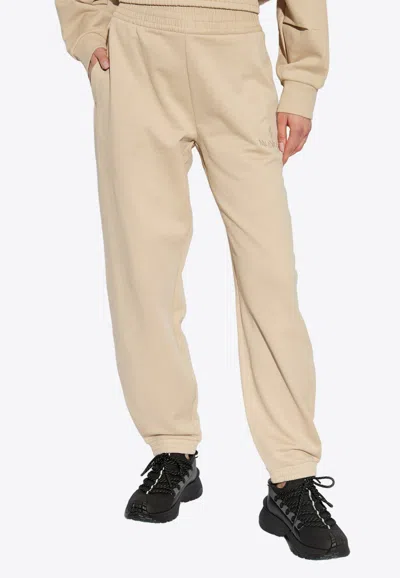 Moncler Embroidered Logo Track Pants In Beige