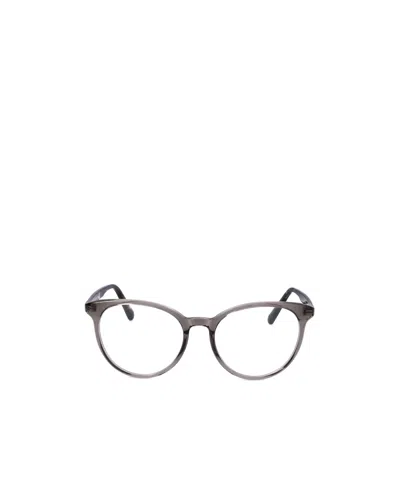 Moncler Eyewear Oval Frame Glasses In Gray