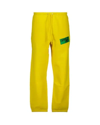 Moncler Genius Moncler 1952 Logo Patch Straight Leg Trousers In Yellow