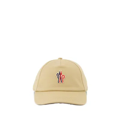 Moncler Grenoble Logo Embroidered Baseball Cap In Beige