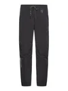 Moncler Logo Embossed Drawstring Track Pants In Black