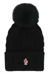 Moncler Wool Hat Featuring Cable Knit And Pom Detail In Black