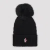 Moncler Wool Hat Featuring Cable Knit And Pom Detail In Black