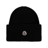 Moncler Ribbed Knit Carded Wool Beanie With Felt Logo Patch In Black