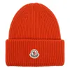 Moncler Logo Hat With Folded Cuff And Ribbed Texture In Red