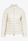 Moncler Fitted Quilted Feather Down Jacket With High Collar In Beige