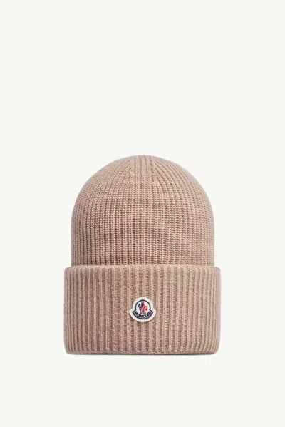 Moncler K20933b00032m1241 Ribbed Wool-blend Beanie In Brown
