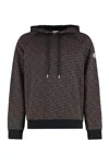 Moncler Logo Jacquard Knitted Drawstring Hoodie In Black