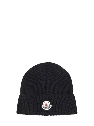 Moncler L10913b00022m1367999 Ribbed Wool-cotton Beanie In Blue