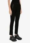Moncler Logo Appliqué Stretch Twill Pants In Black