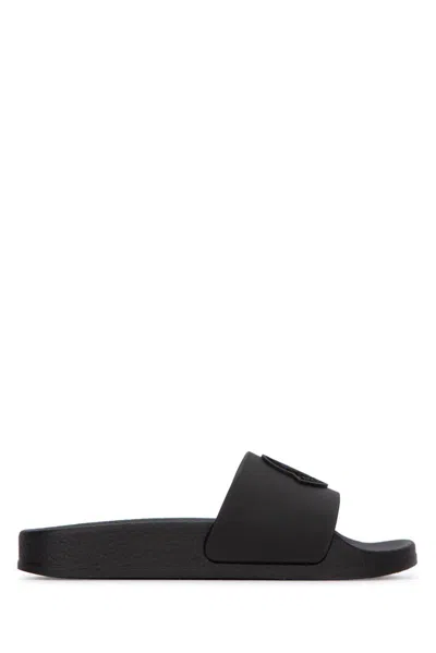Moncler Logo Embossed Sandals In Black