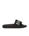 Moncler Logo Embossed Slides In Black