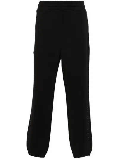 Moncler Logo-embroidered Cotton Track Pants In Black