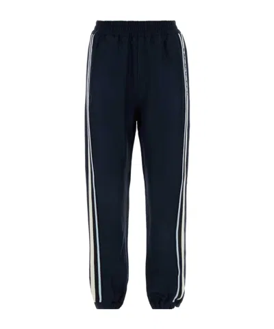 MONCLER MONCLER LOGO EMBROIDERED STRAIGHT LEG SWEATPANTS